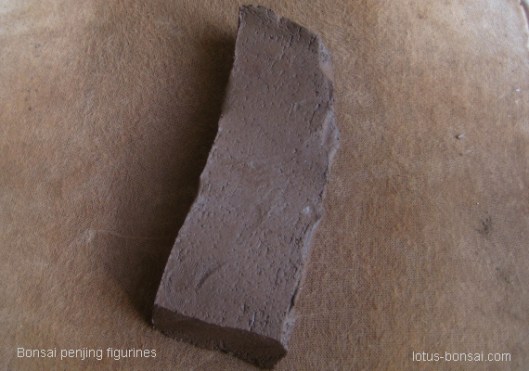 making of bonsai figurine boat 